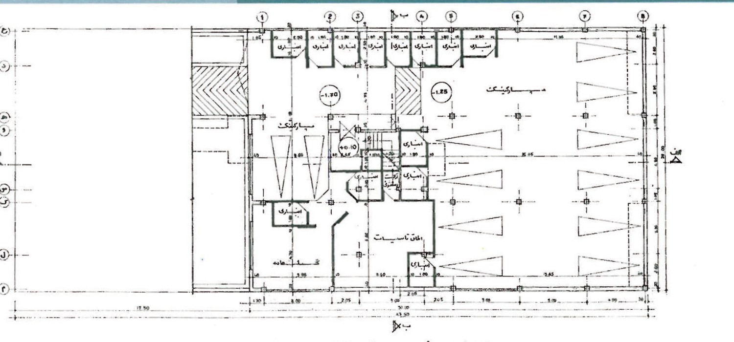 Architectural drawing of Building No. 57's basement plan, showing six diagonal parking bays around the central garage circulation