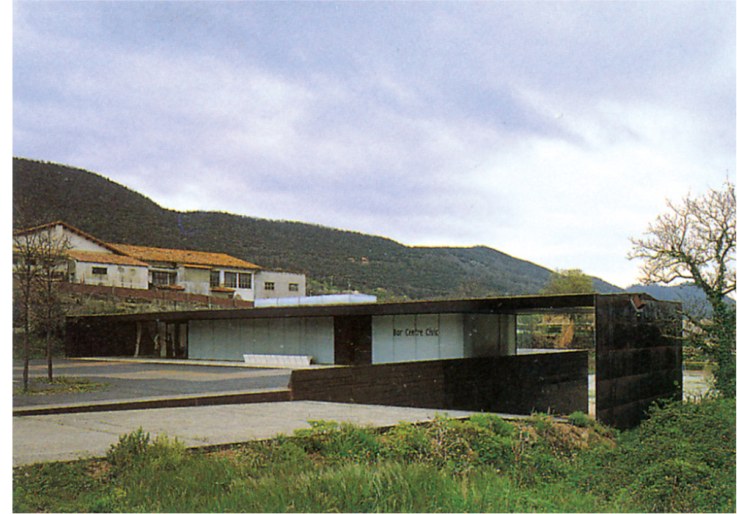 Ruidaura Recreation and Culture Centre by RCR, a horizontal building with black volumes and white-glass walls against rolling hills