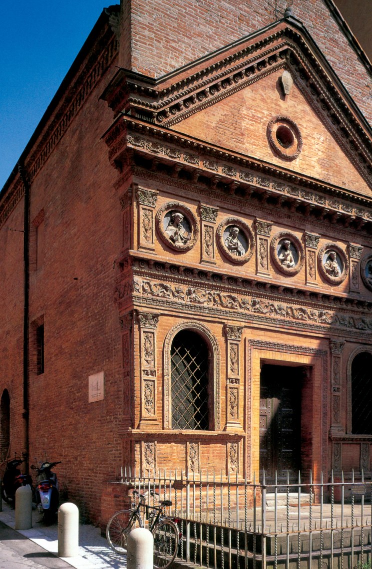Facade of the Santo Spirito church in Bologna, built of brick and terracotta — 14th century