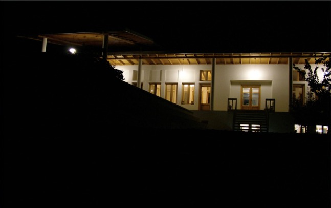 The exterior at night.