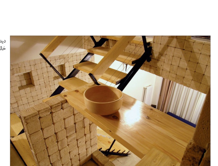 View from the living room toward the entrance and kitchen.