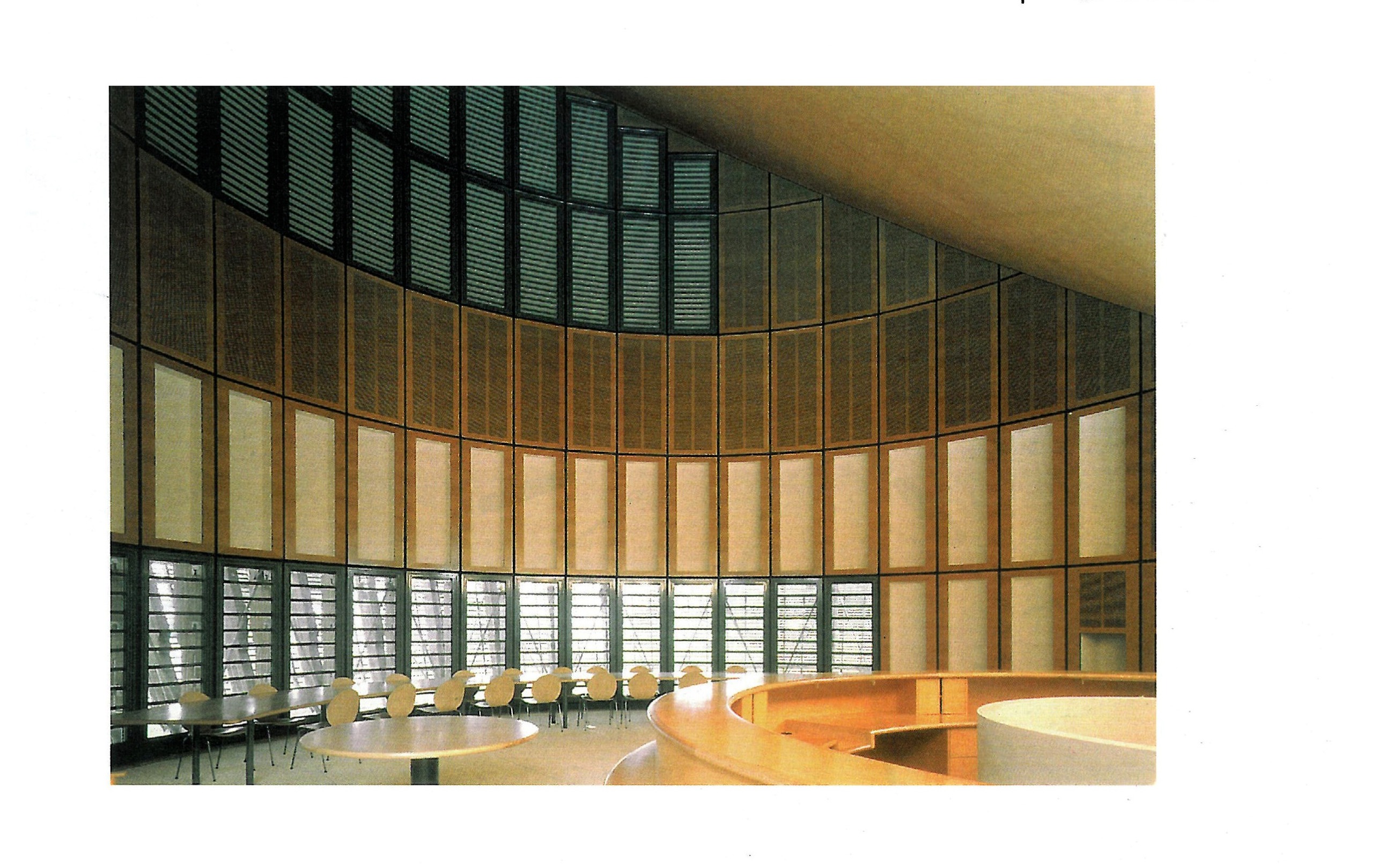 Interior — curved conference room with timber-louvred walls
