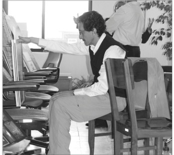 Firouz Firouz reviewing submissions at the 6th Memar Award