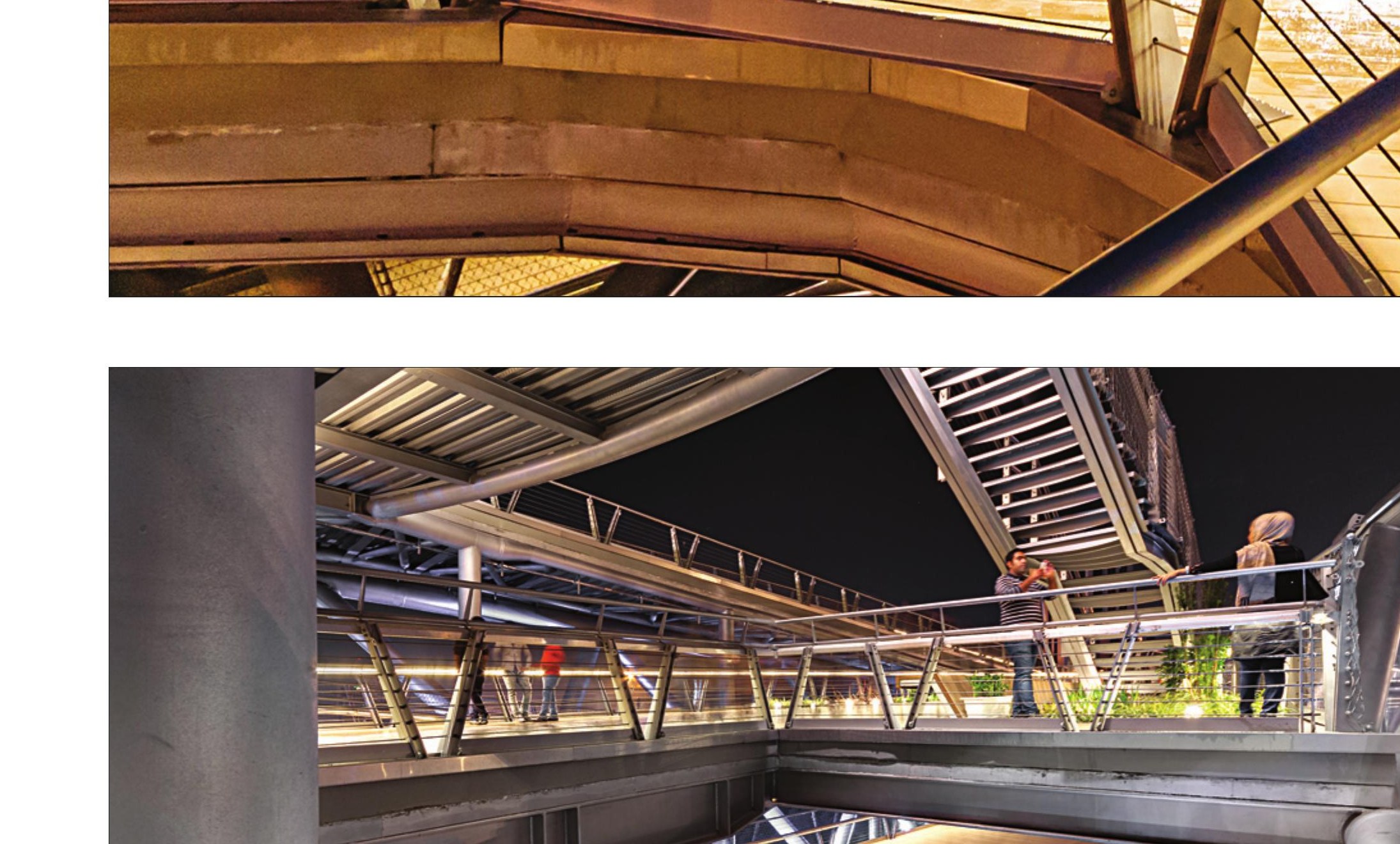 Underside view: 3D steel truss assembled from welded tubes ~50 cm in diameter.