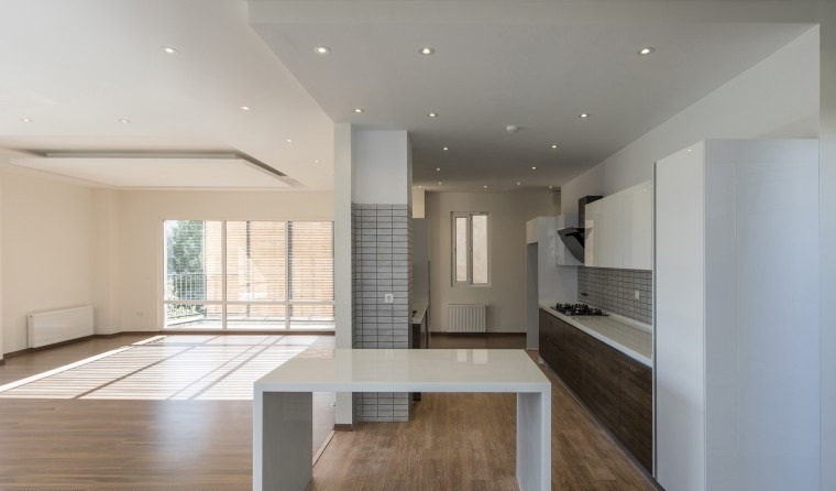 No. 111 Apartment courtyard with mature trees and the recessed entry between the two building wings