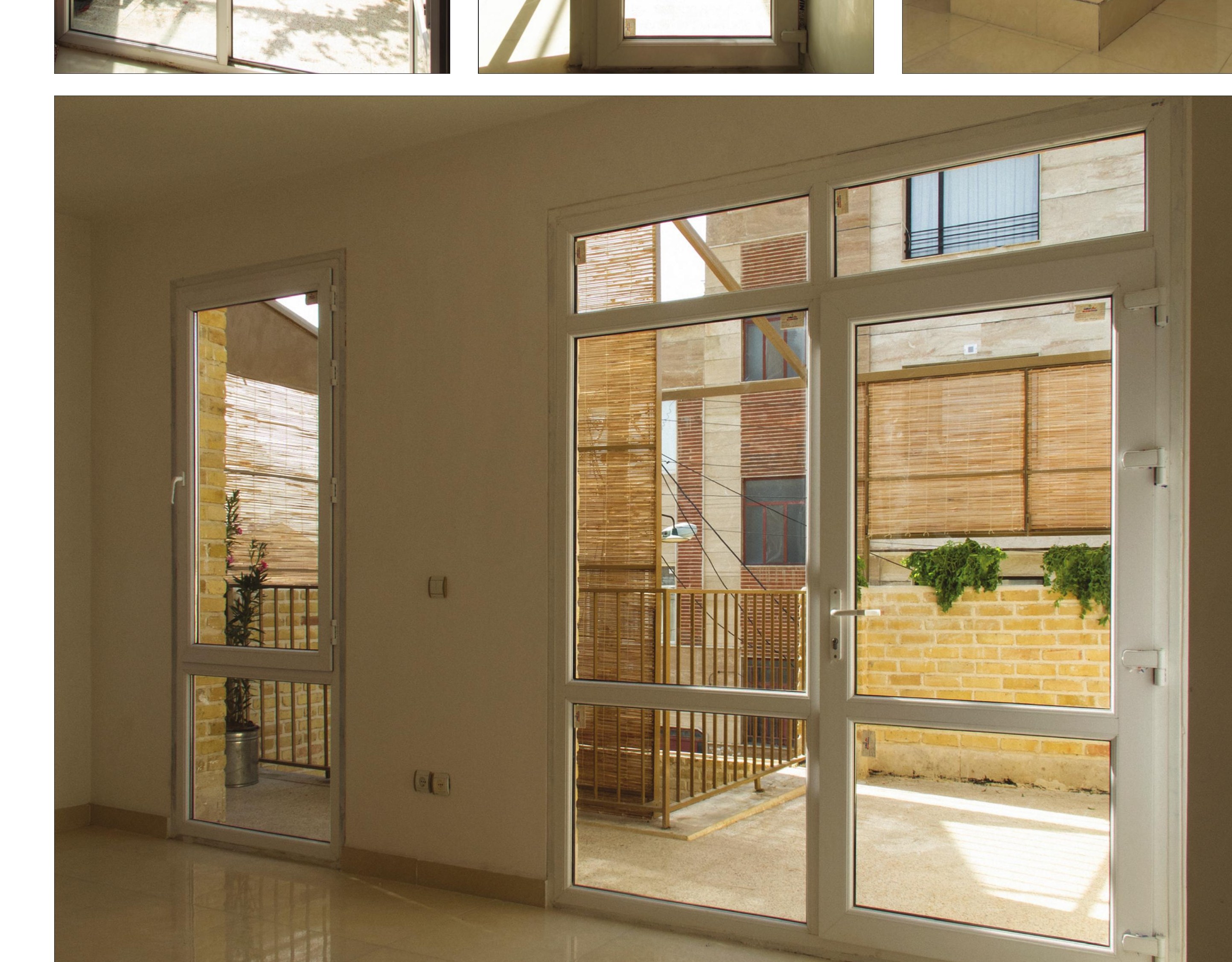Living room with reflective floor and glass walls