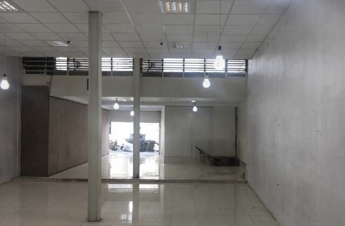 Pre-renovation interior of the clothing shop