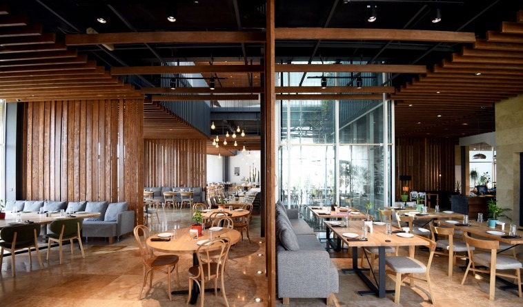 Restaurant interior with wood-slat ceiling