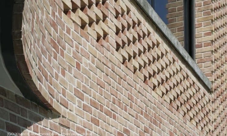 Brick facade detail showing the layered window openings of [Gol] Khaneh Villa