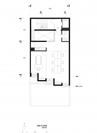 Second-floor plan of the Kar-Khaneh Office Building showing the long open office around the stair, kitchen and toilets at the north end
