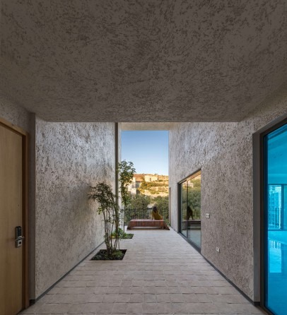 Garden room with views through the facade voids