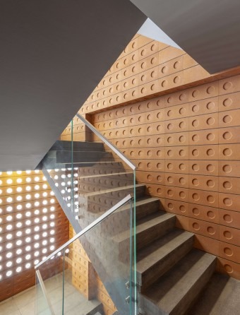 Brick wall at the urban scale