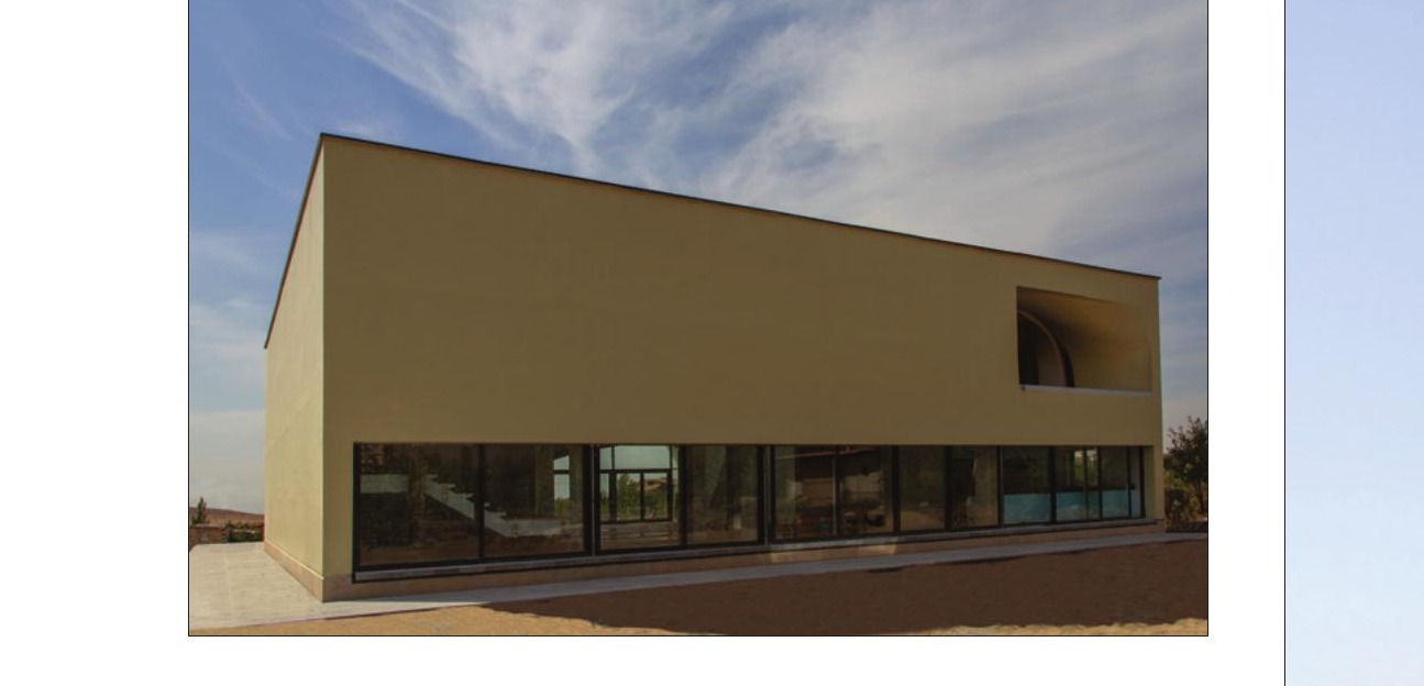 Long sand-yellow box exterior with reflective full-height window band