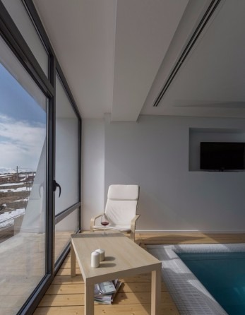 Light-filled living space with mountain view