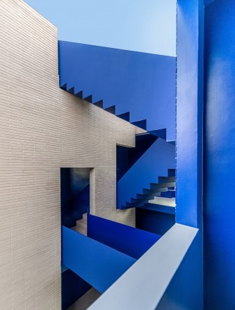 Blue stair tower threading the floors