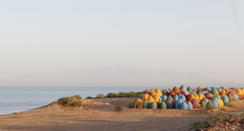 Pier-sand sandbag rings forming a superadobe dome