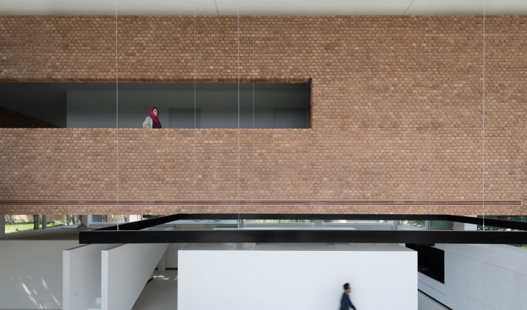 Safadasht Dual aerial — both volumes facing each other across the central courtyard with mature trees