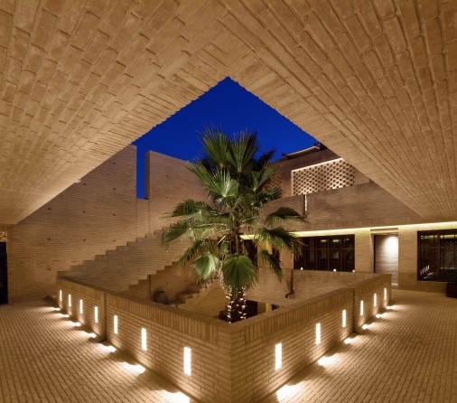 Inner courtyard with a brick well and shallow pool
