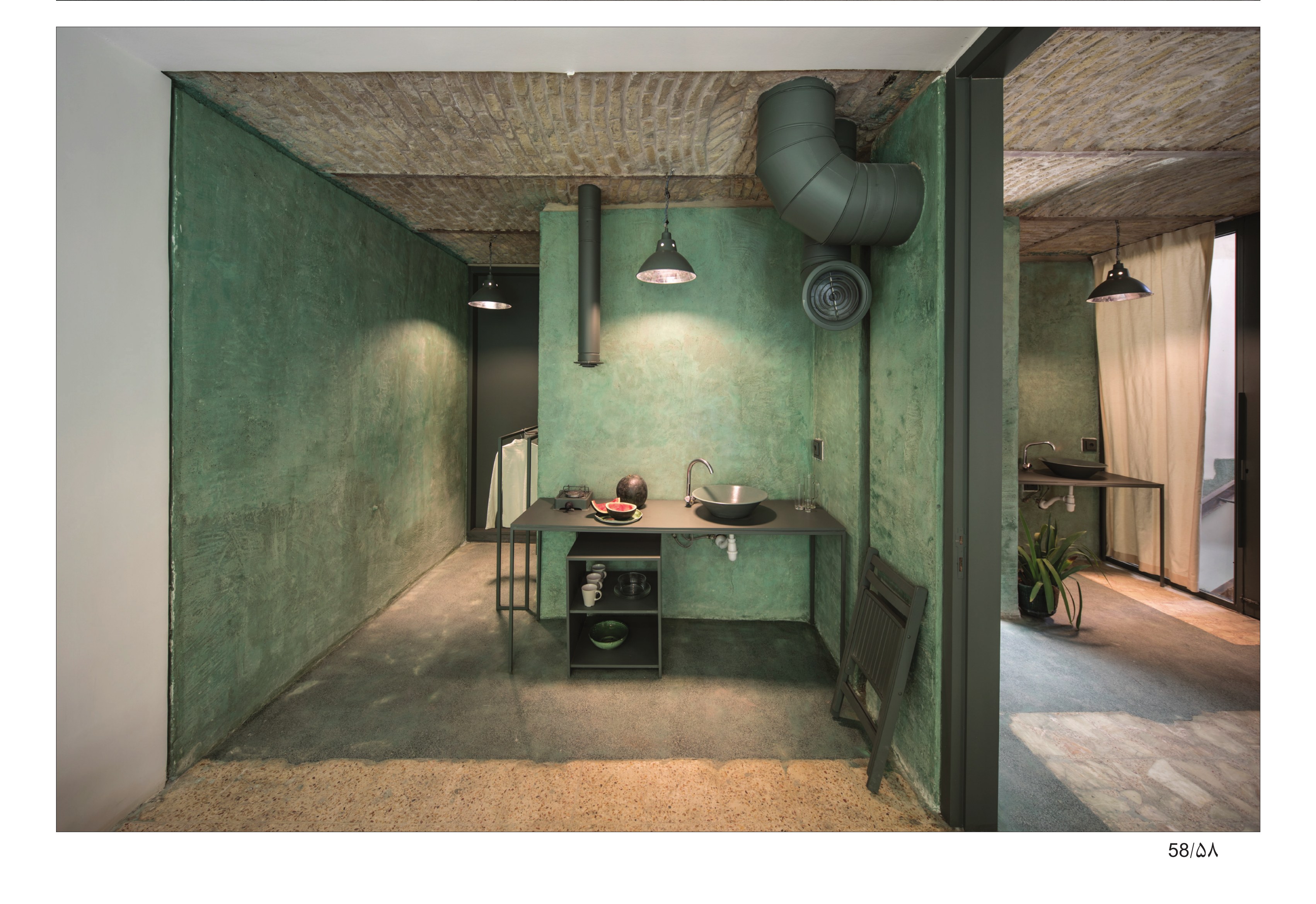 Kitchenette with exposed venting and arch-brick ceiling
