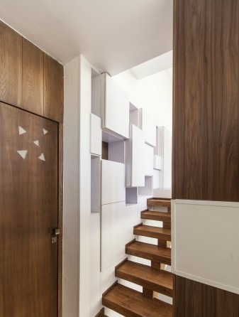 Small House — view through one of the planted balconies looking out over the city