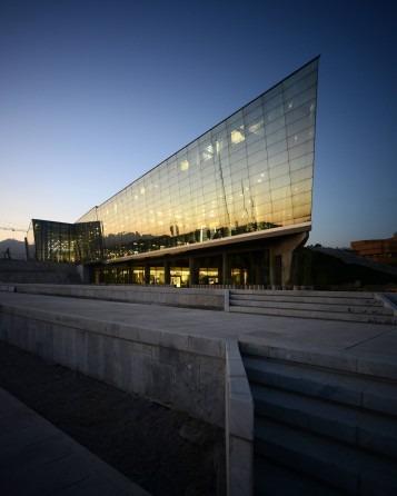 Tehran Book Garden glass facade reflecting the lake along the western elevation