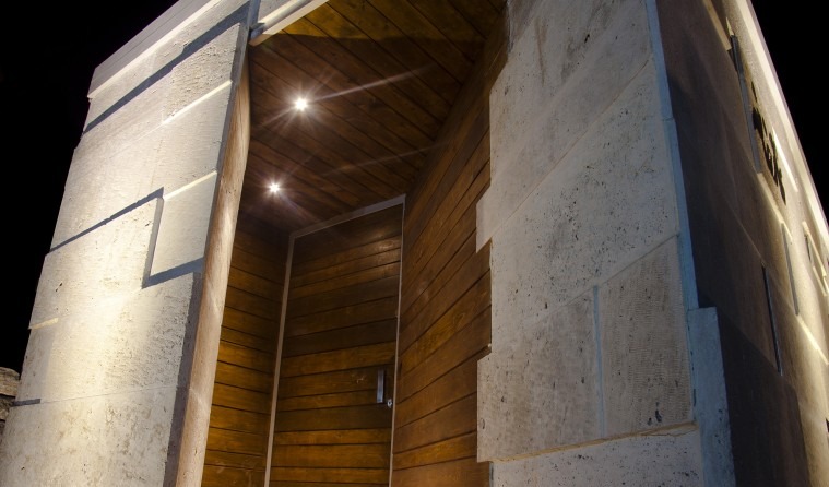 Detail view of the travertine masonry coursing on the chapel wall